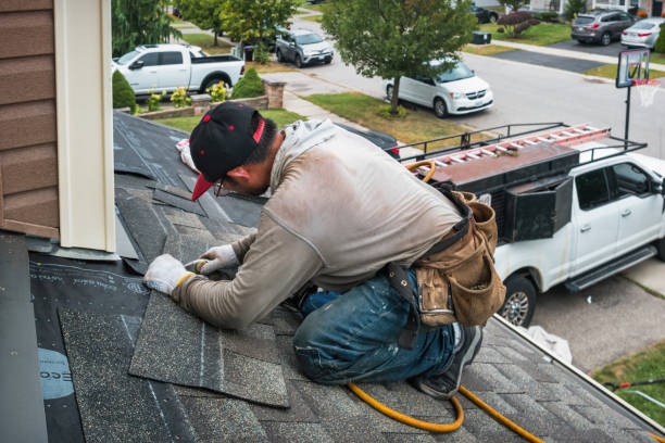 Professional Roofing technician working in Wedgefield, FL